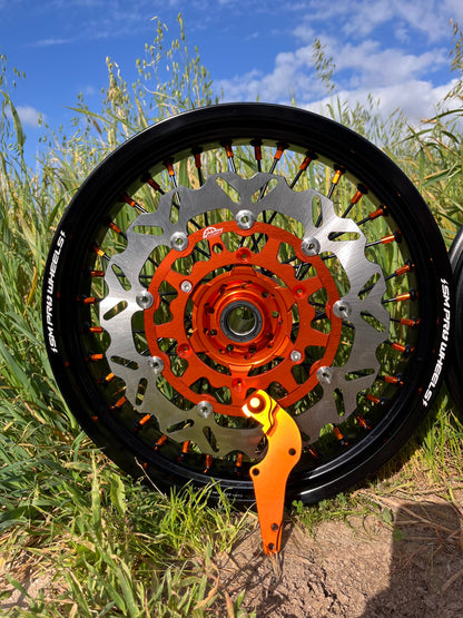 Llantas Supermotard Aro negro , bujes y accesorios naranja